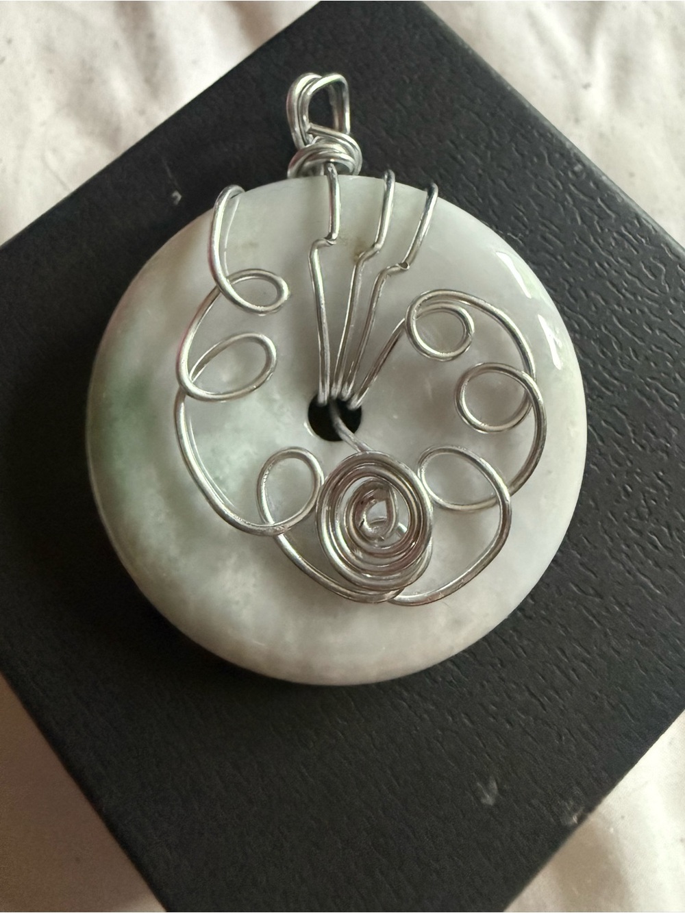 Handcrafted White Jade Donut Pendant with Silver Wire Wrap